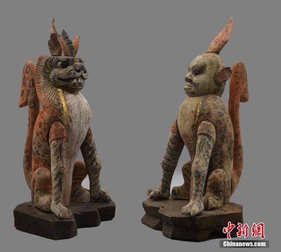 圖為慕容智墓出土鎮(zhèn)墓獸。 中新社發(fā) 甘肅省文物局 供圖